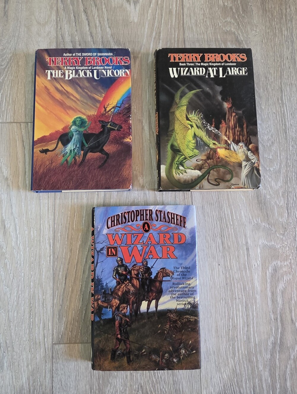 3 vintage Fantasy Hardbacks. 1st Edition 1st Print Of The Wizard In War